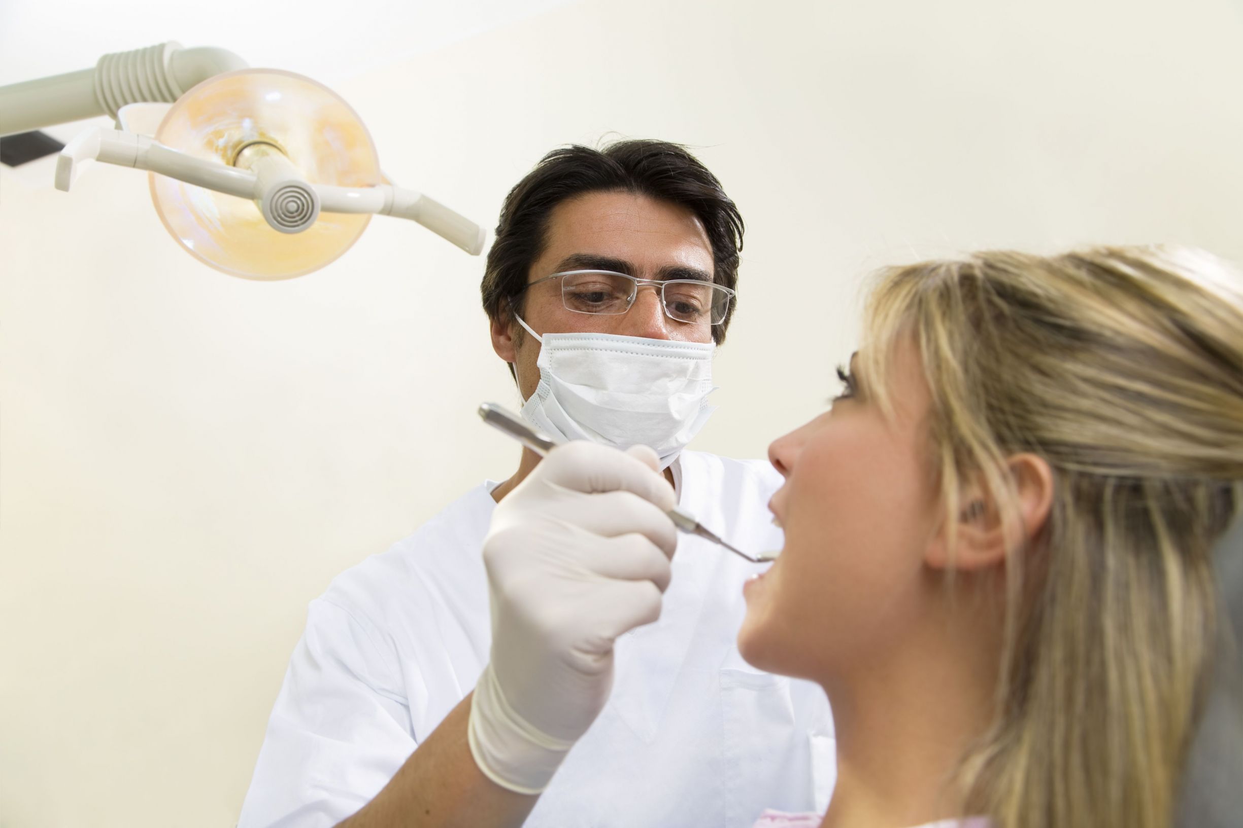 Transosteal Dental Implant